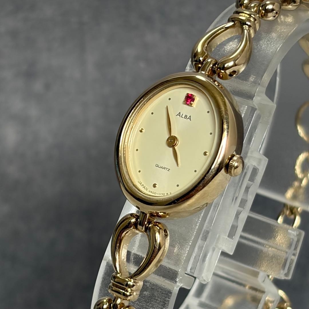 Vintage ALBA Ladies Quartz Watch Gold Tone Bracelet Red Stone Accent Working