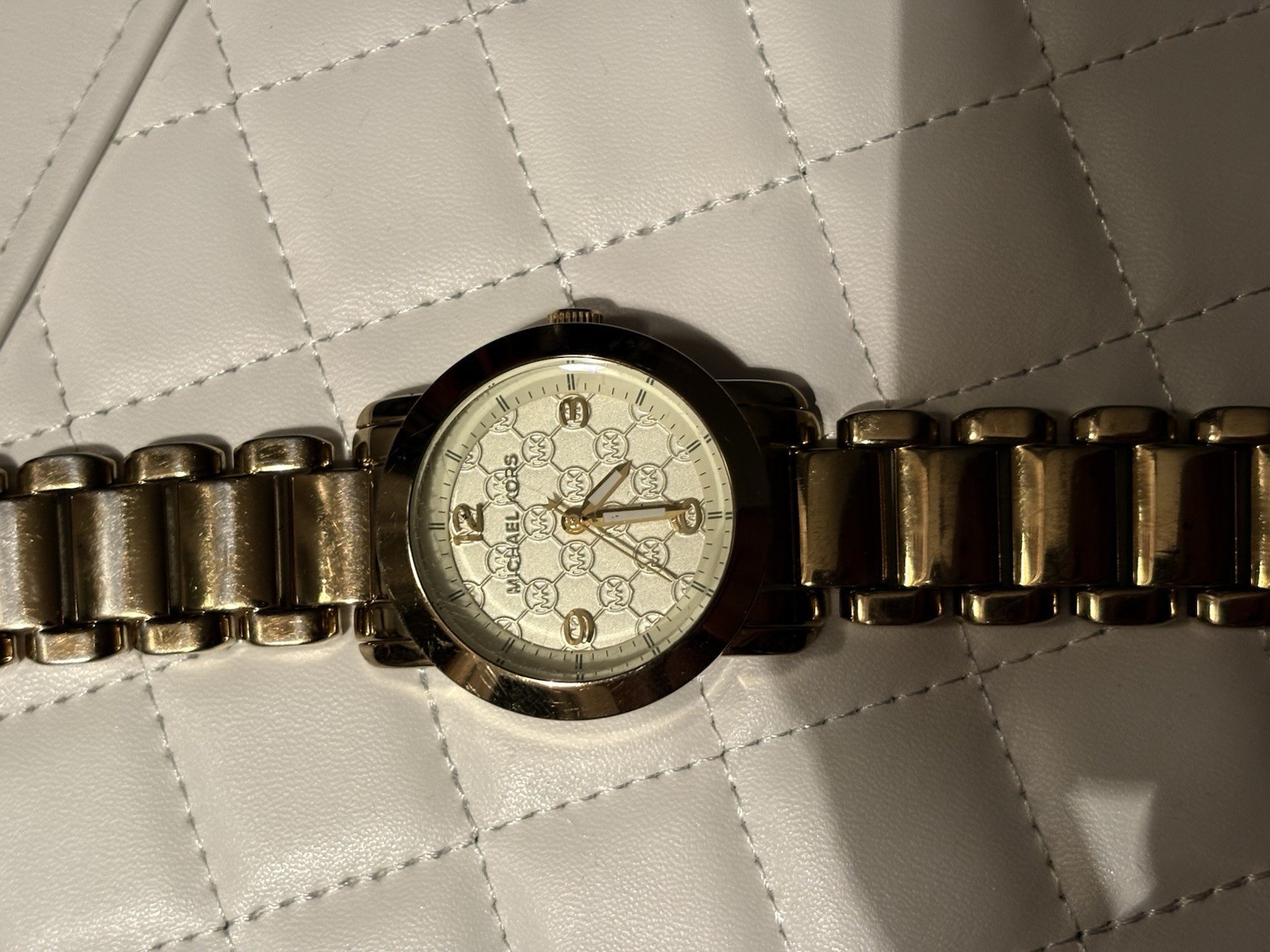 Michael Kors Women’s Quartz Gold-Tone Logo Dial Round Bracelet Wristwatch