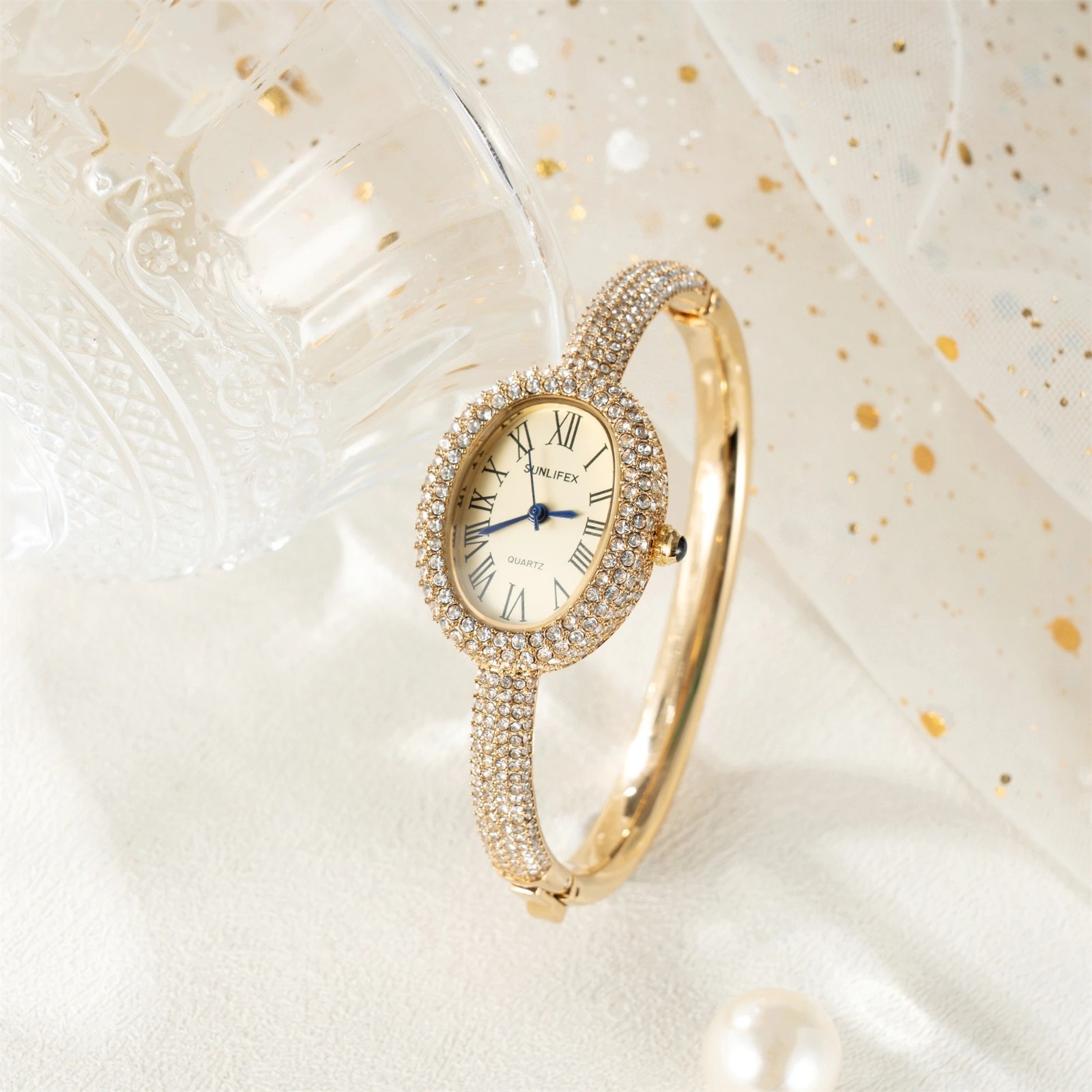 Luxury Crystal Oval Bangle Watch For Women Roman Numeral Dial Rhinestone Inlaid