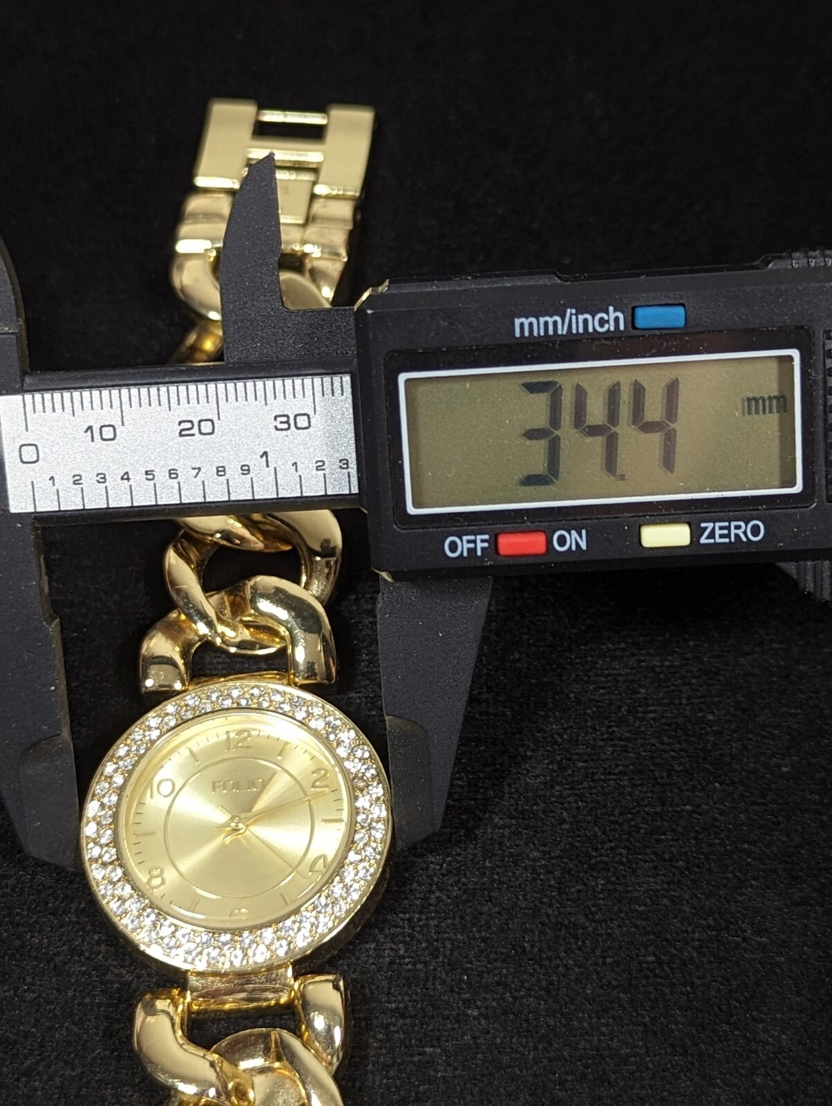 Folio Womans Crystal Accent Gold Tone Round Case Chain Link Bracelet Watch 7.5in