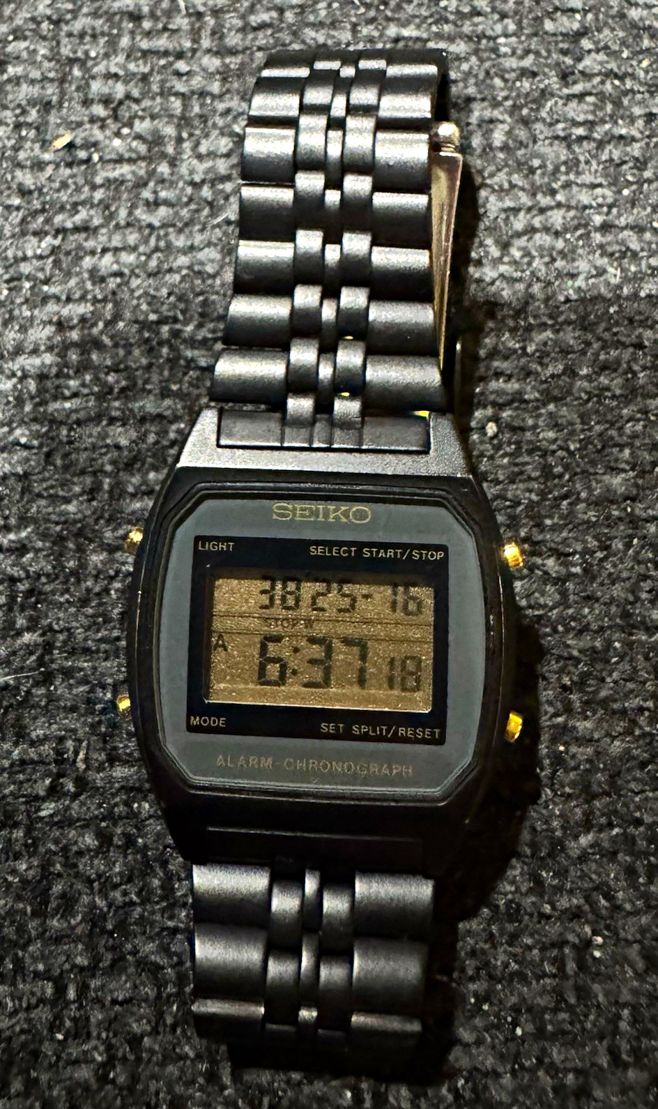 Seiko Alarm Chronograph Digital Quartz Alarm/Light Black SS Bracelet Square 32mm