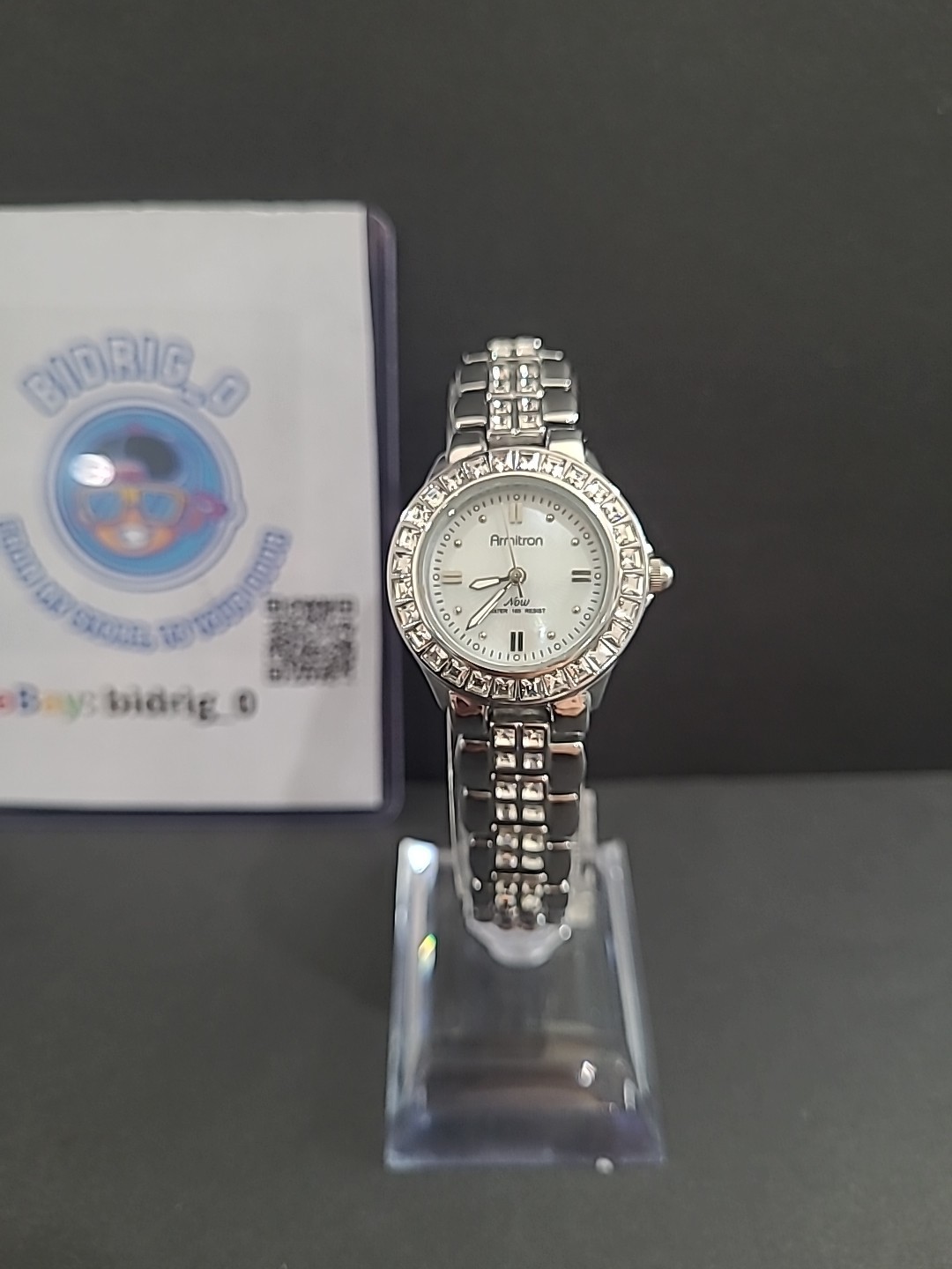 Armitron mother of pearl dial, rhinestones womens watch. New Battery Runs Great.