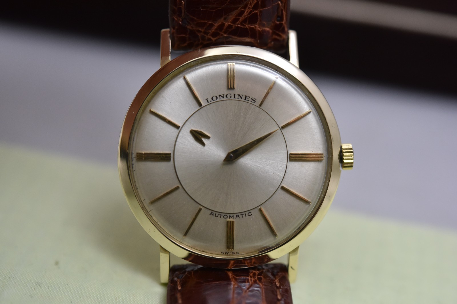 Longines mystery-dial 14 K gold, 34mm in diameter, w/ original boxes, excellent