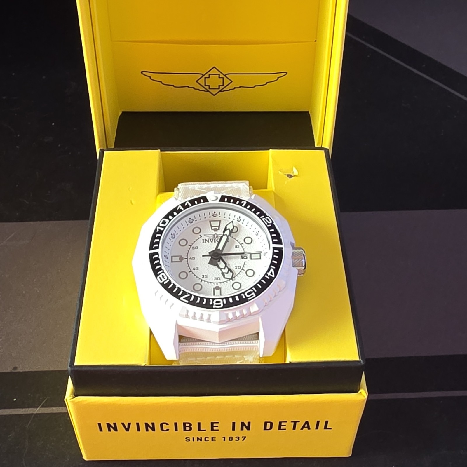 Invicta Akula Vectara Men’s 55mm Watch White/White Black Bezel. Nylon Strap
