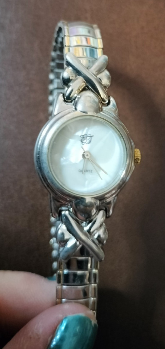 Elizabeth Taylor Mother of Pearl Face Silver tone Watch