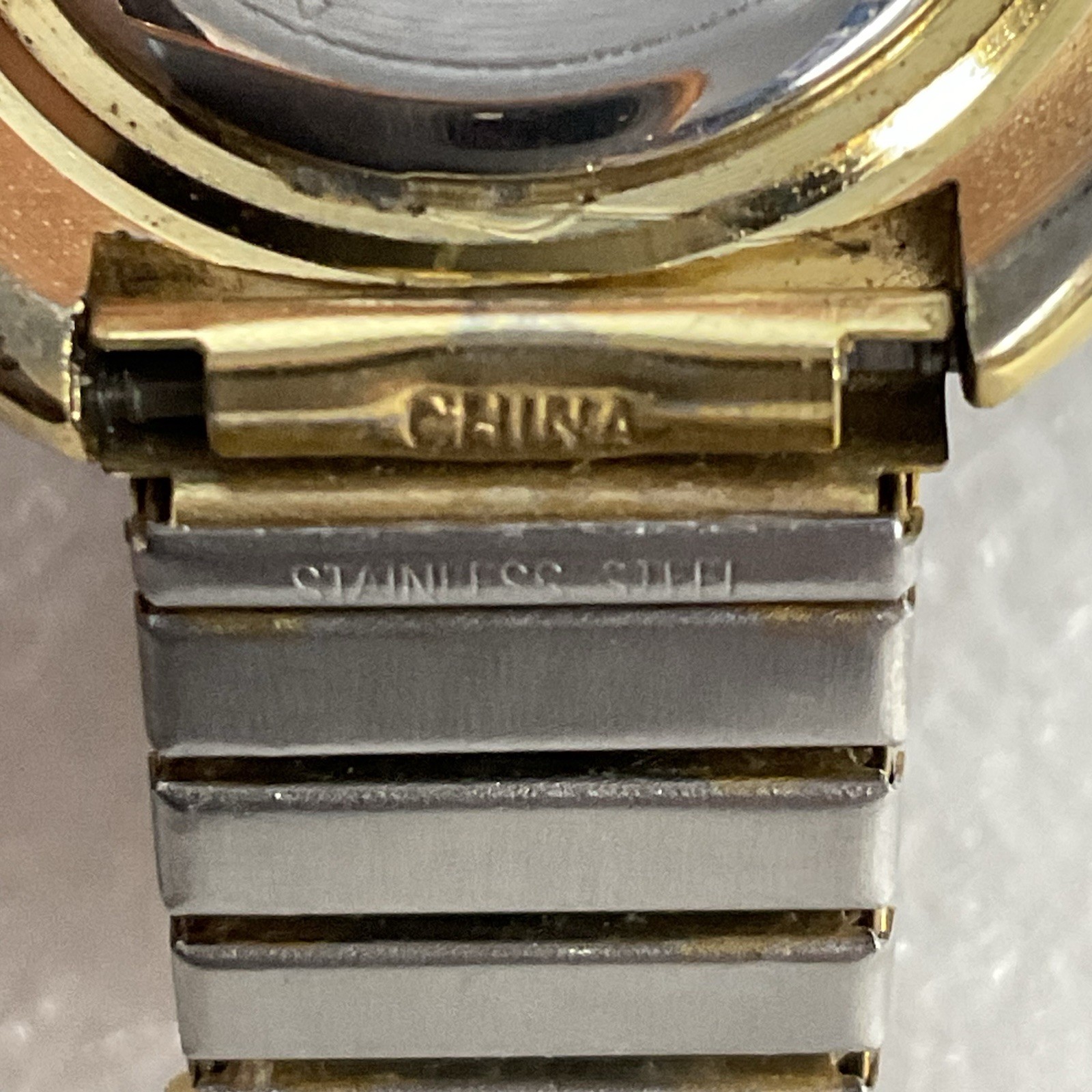Lucky Star Titanium Purple Face Hold Tone Stretch Band Watch