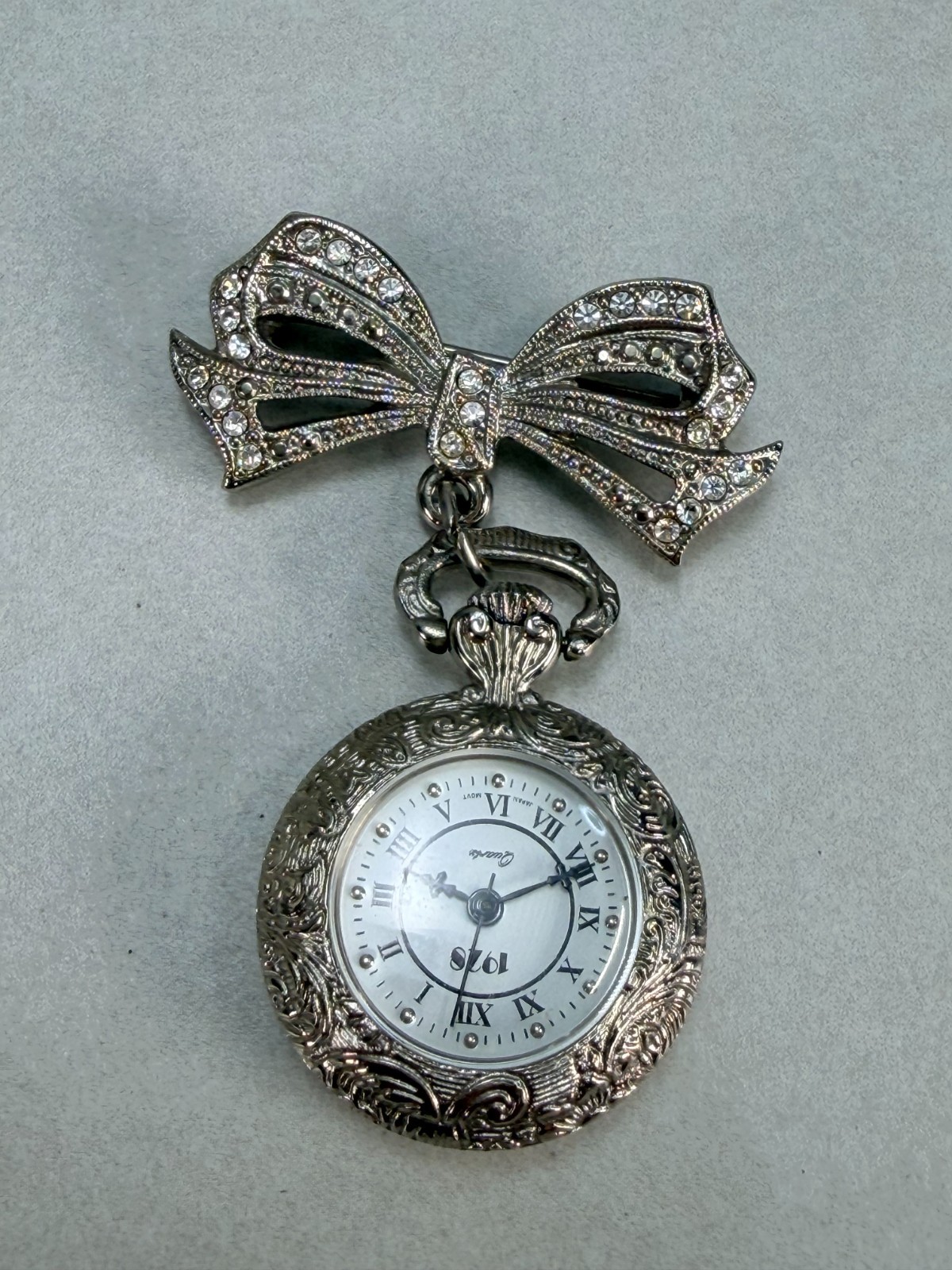 Vintage 1928 Romantic Revival Bow Watch Brooch Rhinestone Silver Tone Pin