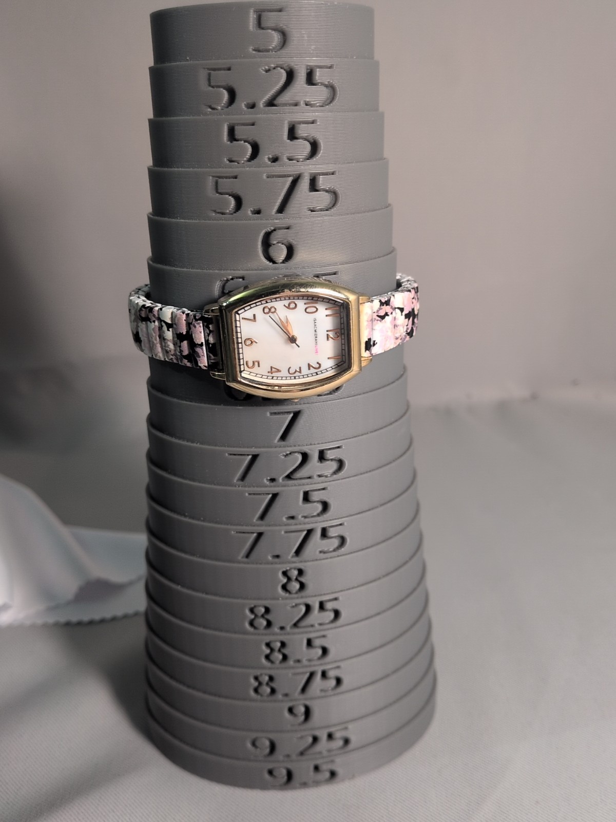 Isaac Mizrahi Womans Floral Band Watch Mother Of Pearl Dial Gold Tank Style Case