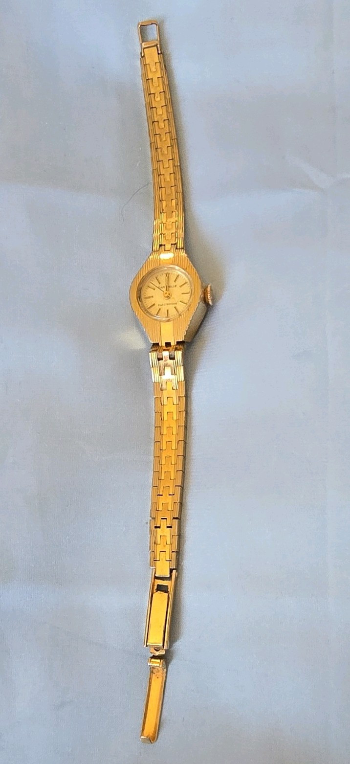 Caravelle Electrotime Quartz Women’s Vintage Analog Gold Bracelet Silver Dial