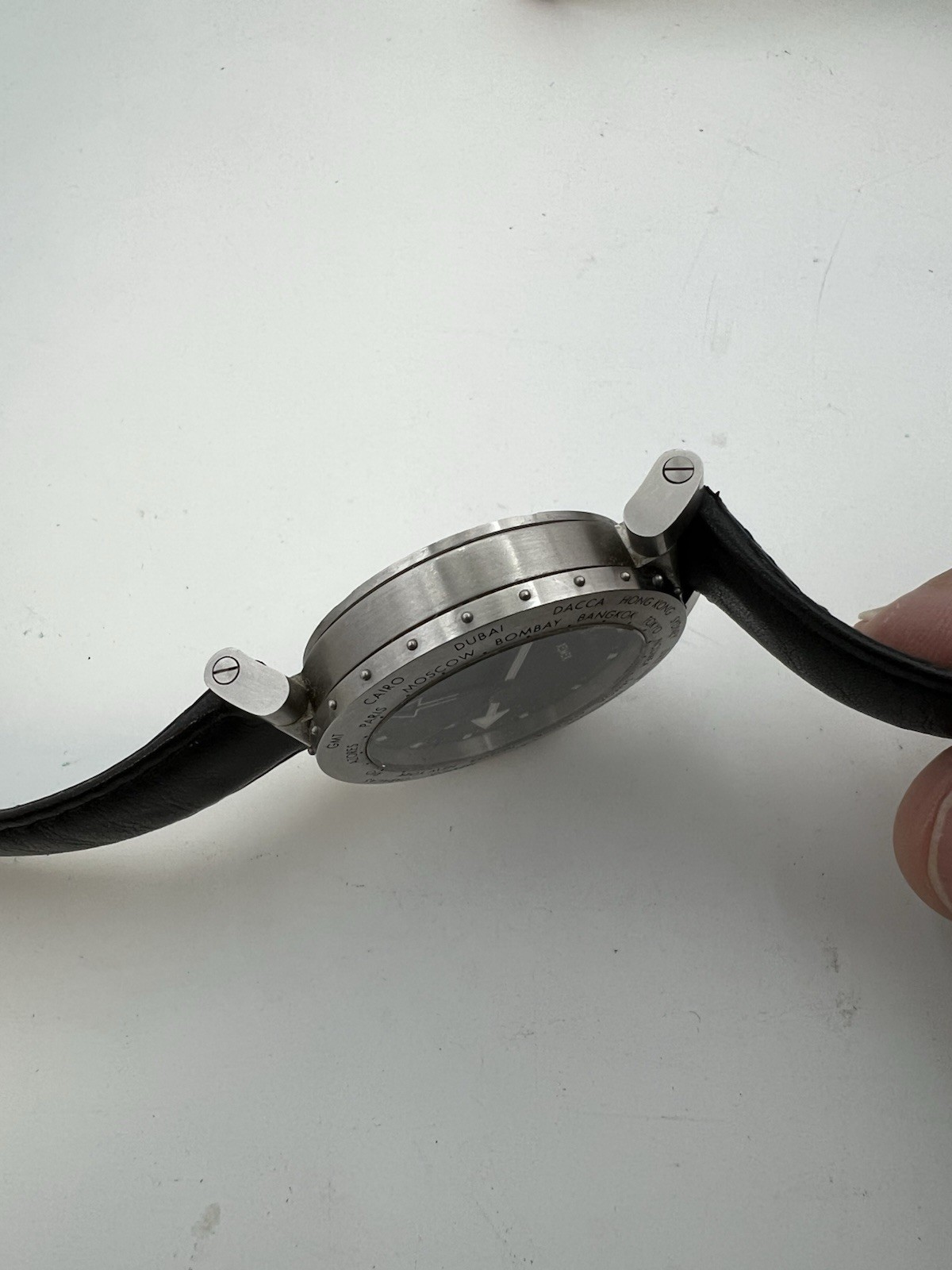 XEMEX World timer Automatic SS Watch with black leather band. Swiss Made
