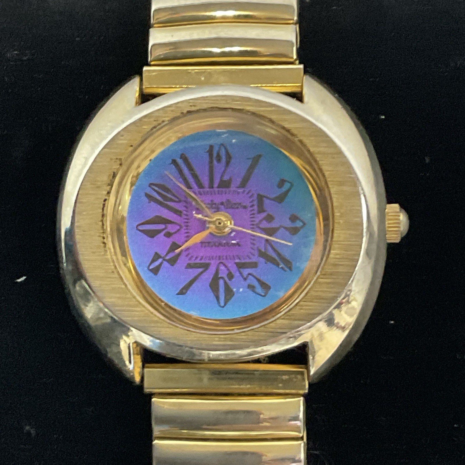 Lucky Star Titanium Purple Face Hold Tone Stretch Band Watch