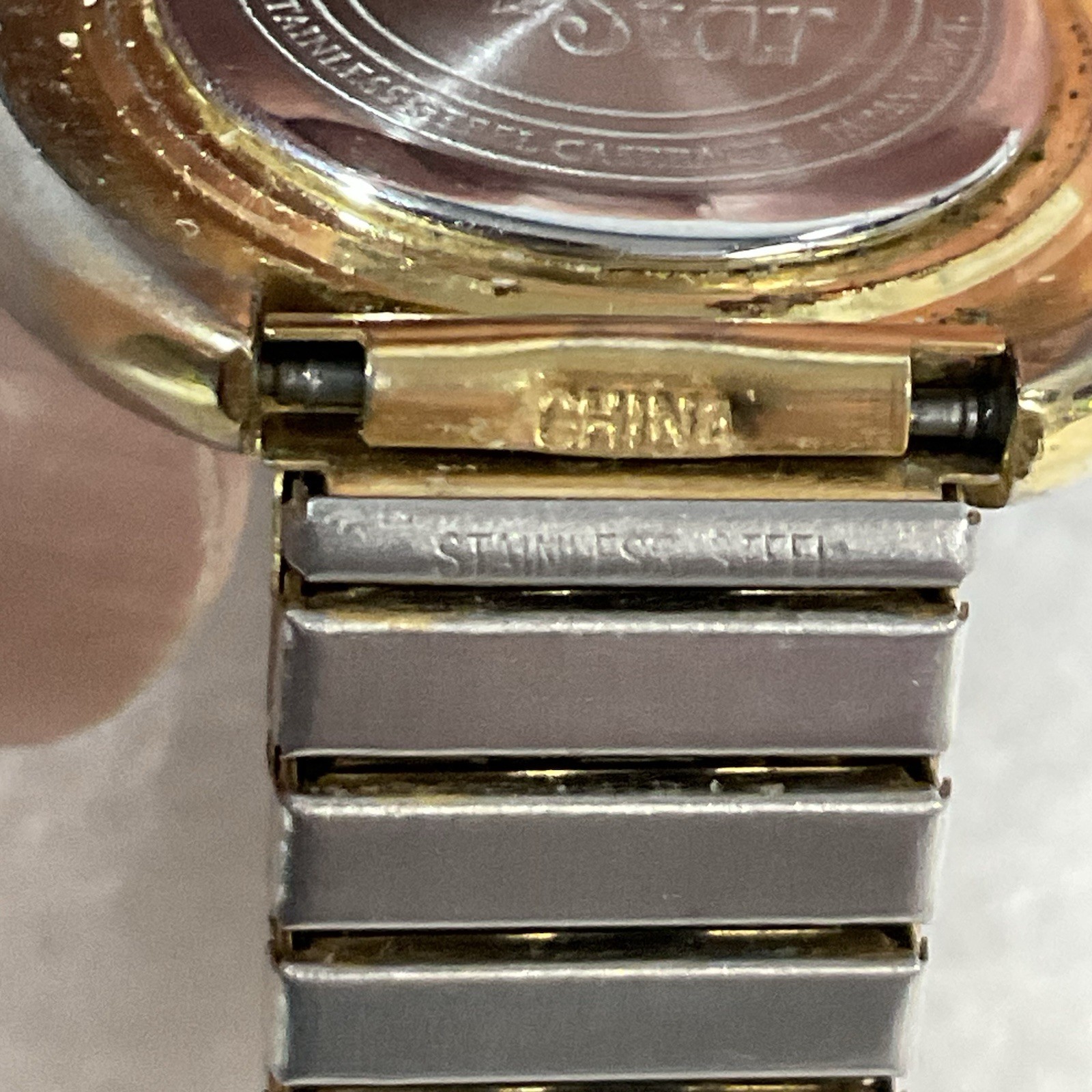 Lucky Star Titanium Purple Face Hold Tone Stretch Band Watch
