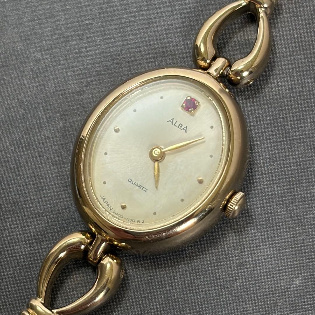Vintage ALBA Ladies Quartz Watch Gold Tone Bracelet Red Stone Accent Working