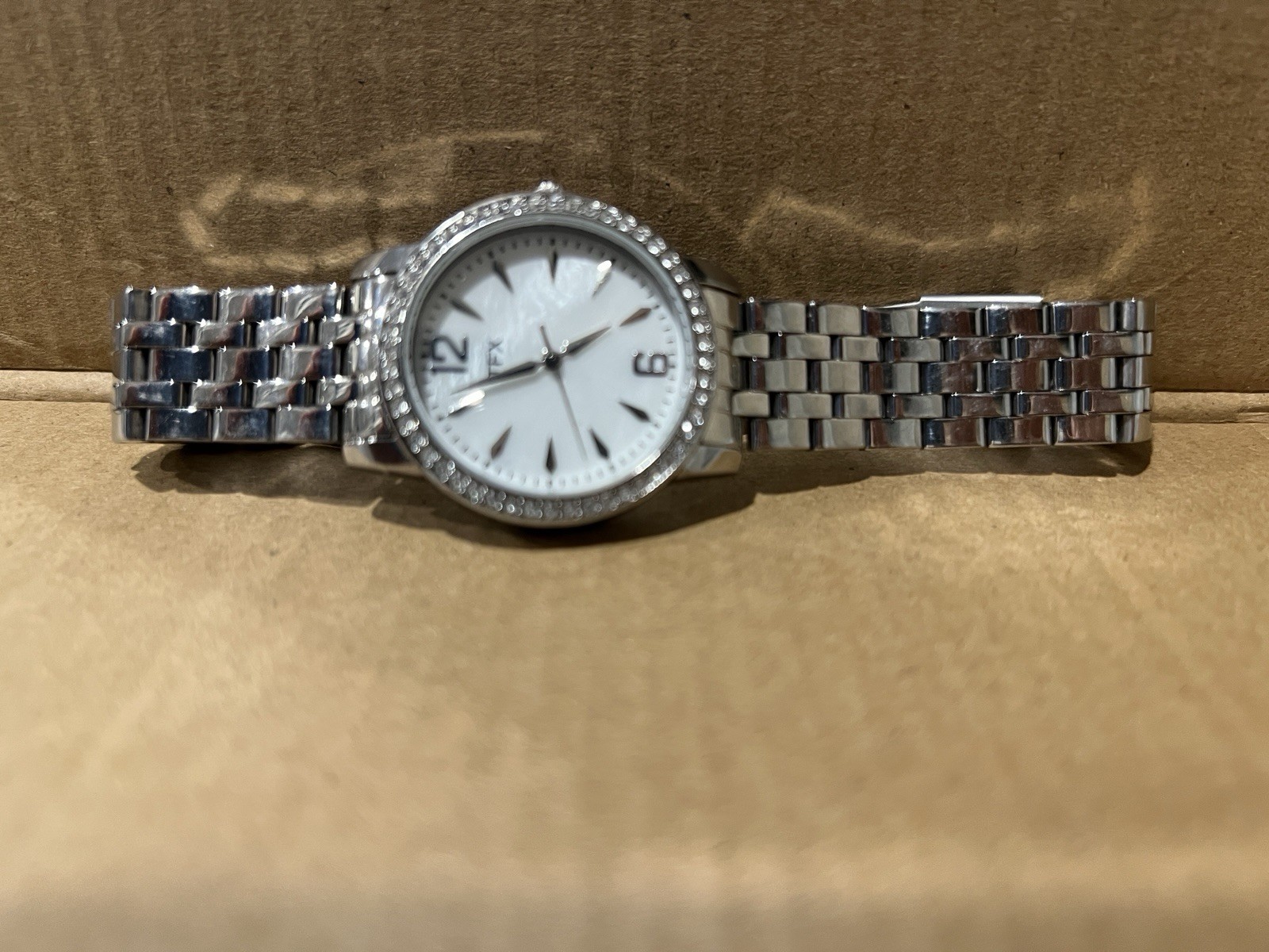 Bulova TFX Women’s Quartz Watch White Dial Gem-Set Bezel Silver Bracelet