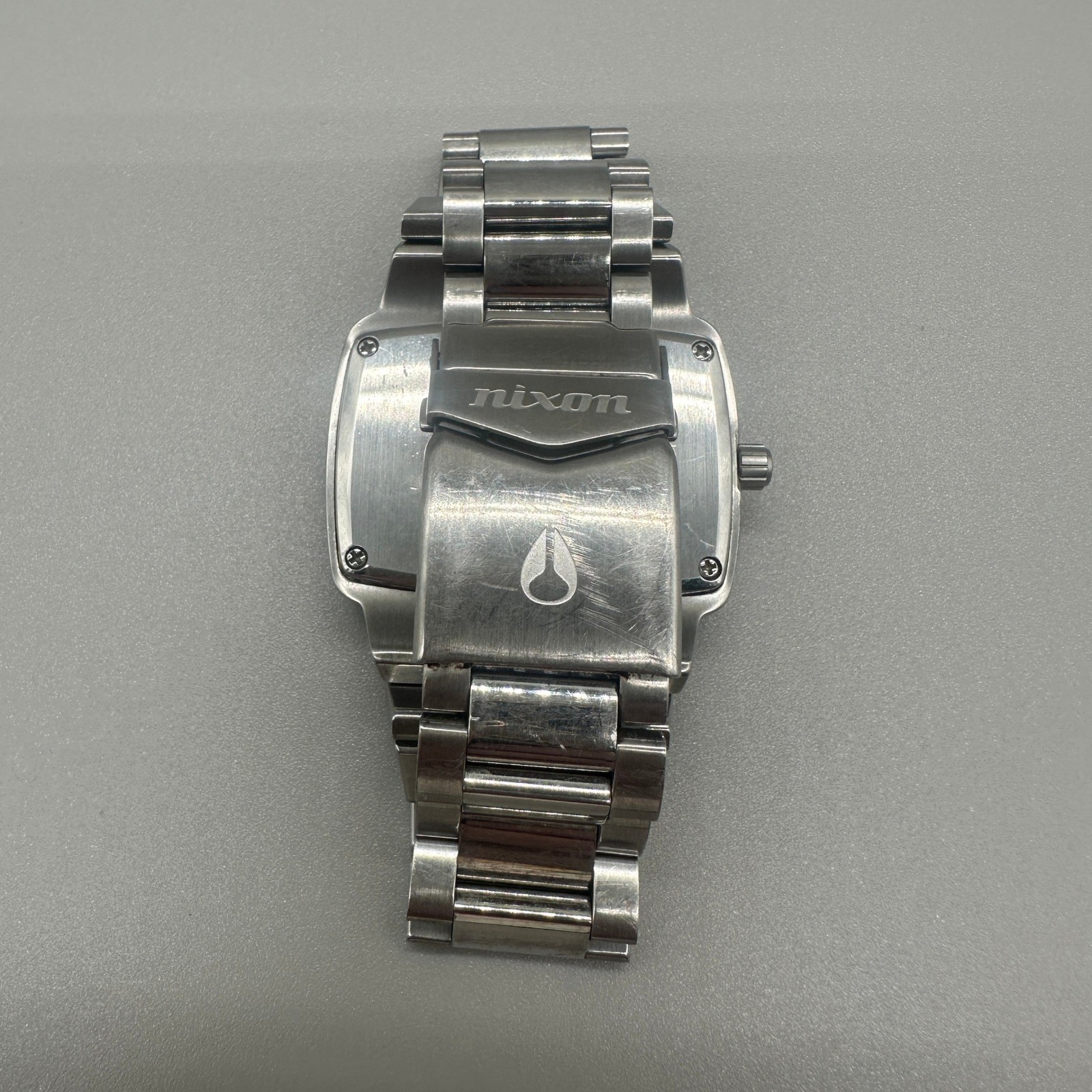 Nixon The Player Watch Mens Silver Stainless Steel Black Dial Diamond Accent