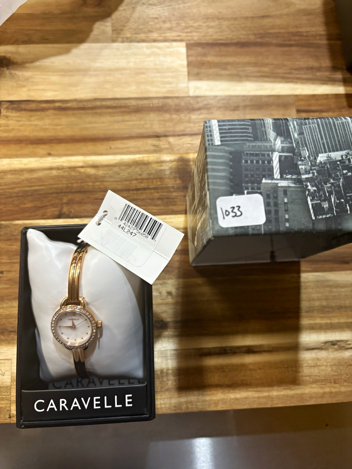Caravelle Women’s Quartz Gold-Tone Analog White Dial Gem-Set Bezel Box