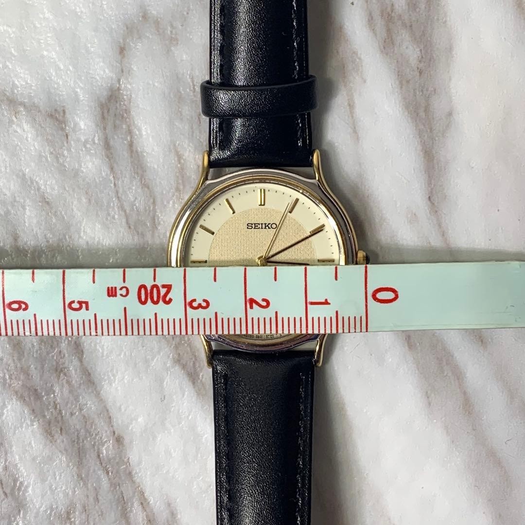 Seiko 5E31-6D60 Quartz Watch Gold Silver Combo Black Dial Used