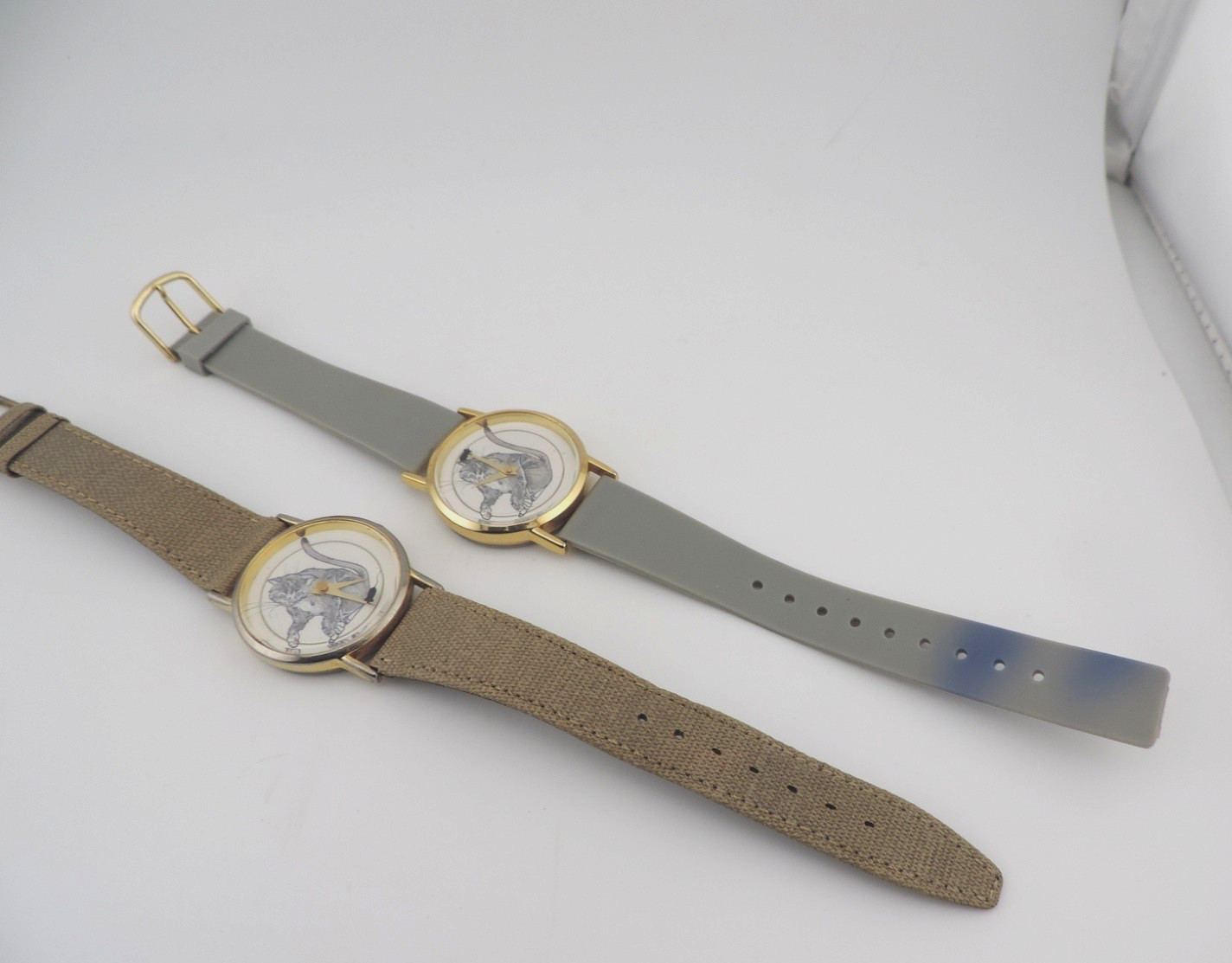 lot of 2 Cat and Mouse Rotating Watch.