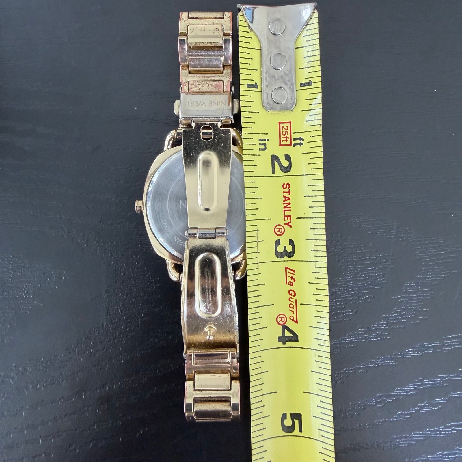 Nine West Women’s Black Dial Gold Tone Stainless Wrist Watch (PC21J7)
