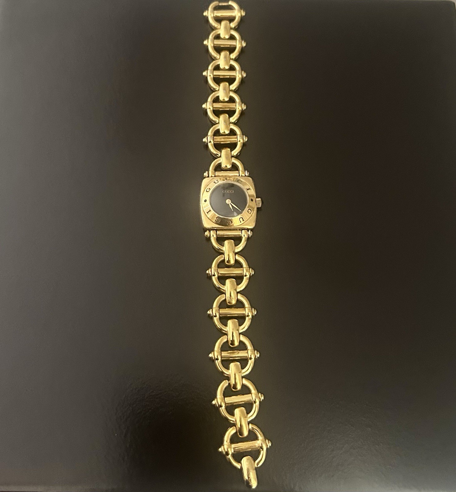 Gucci wmns lovely 6 1/2″ gold-black link watch, new battery free ship $424.99