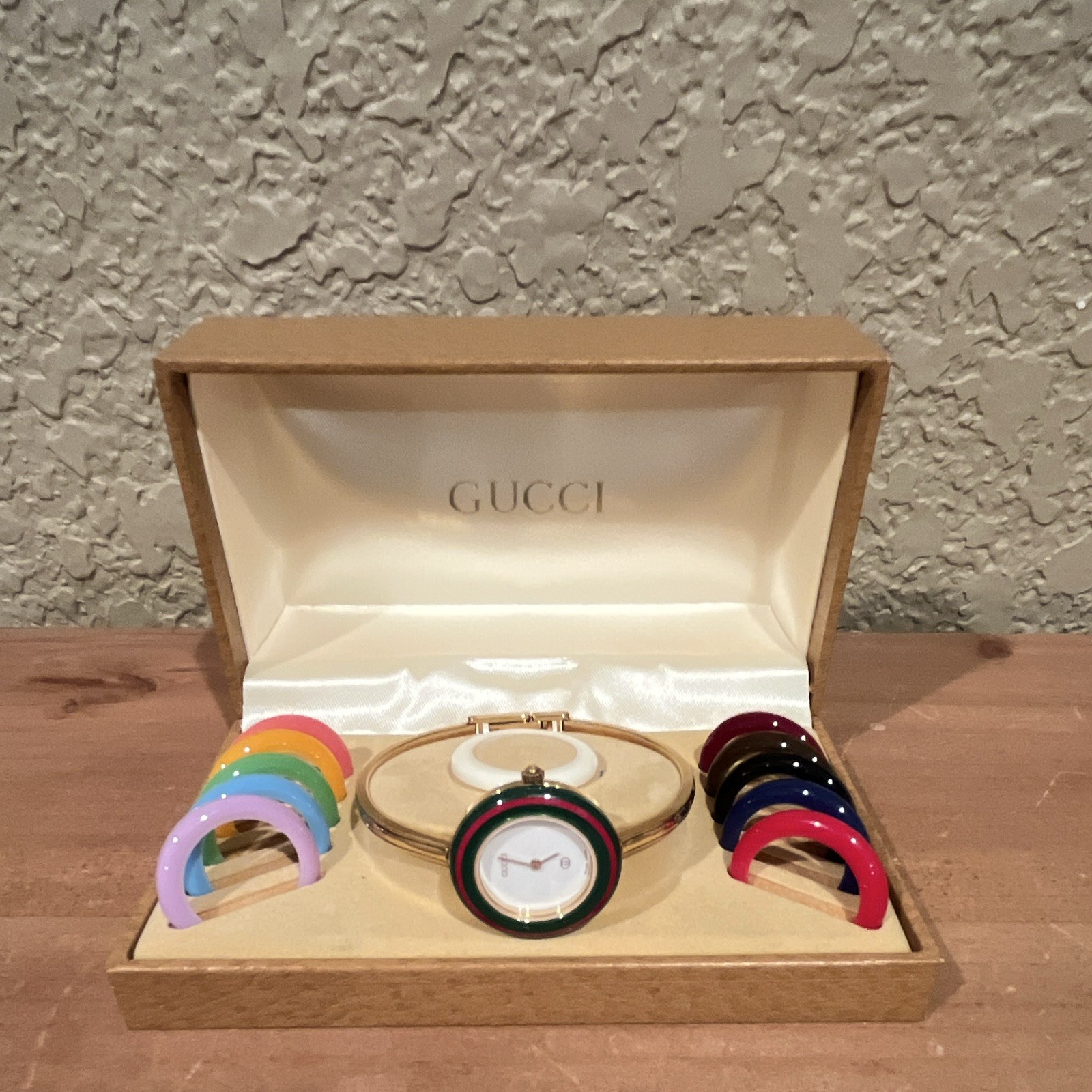 Gucci Change Women’s Gold Tone Quartz Bangle Watch w/ Interchangeable Bezels Box