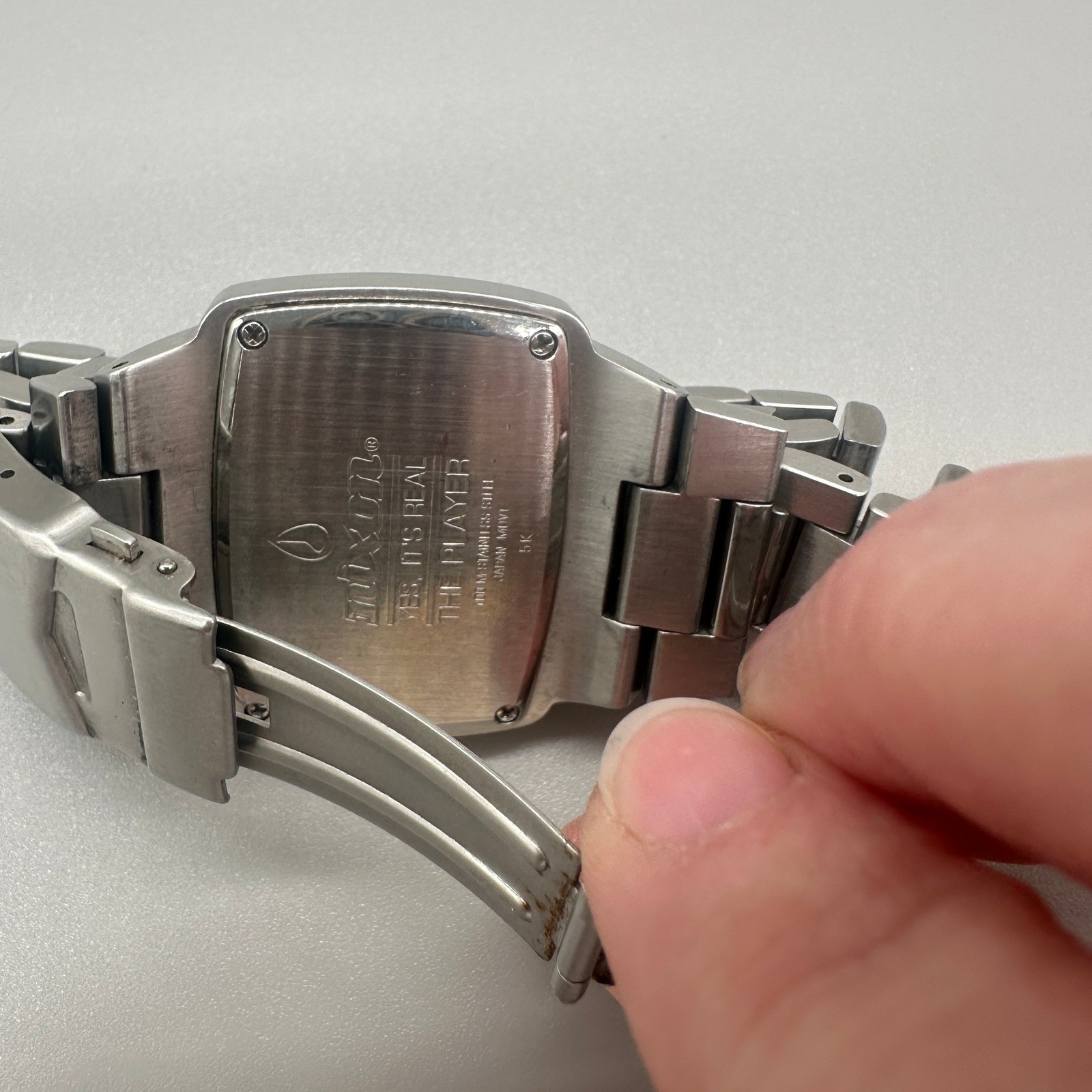 Nixon The Player Watch Mens Silver Stainless Steel Black Dial Diamond Accent