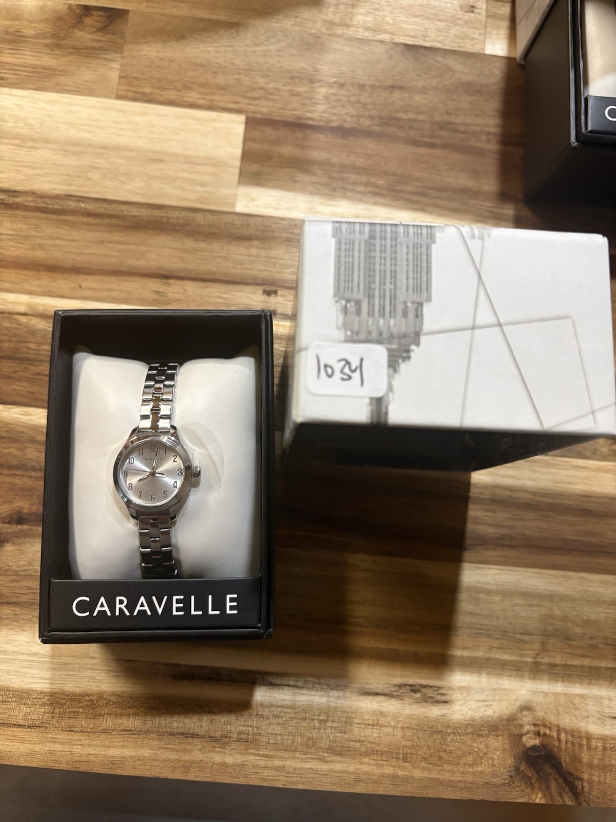 Caravelle Women’s Quartz Analog Silver Sunburst Dial SS Bracelet Watch w/ Box