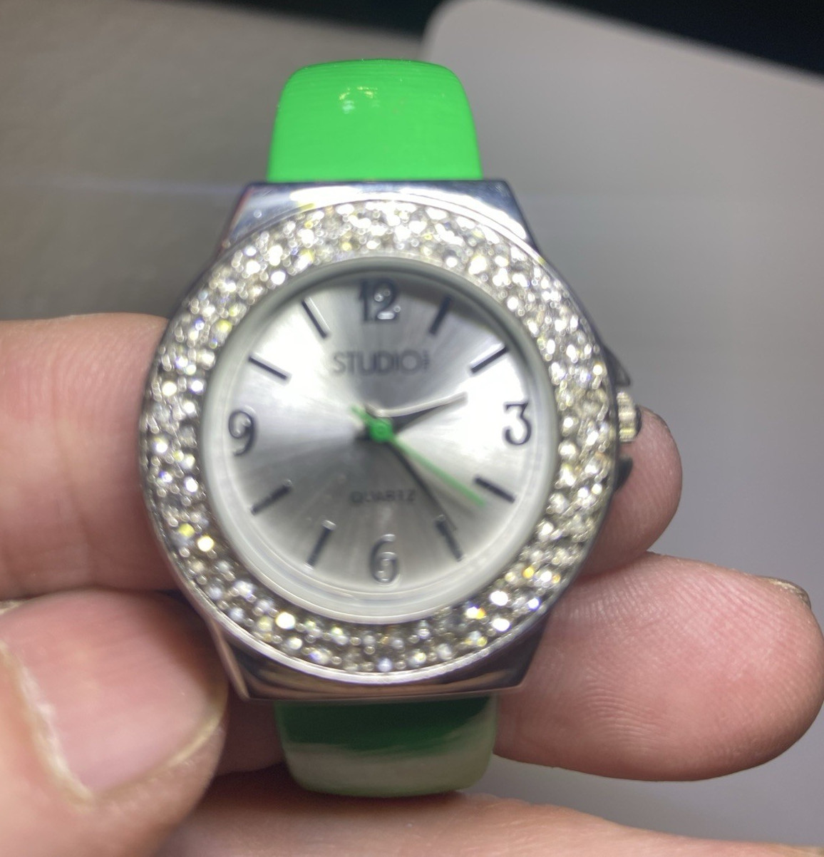 Studio Women’s Quartz Wristwatch Green Bangle Gem-Set Bezel Silver Dial