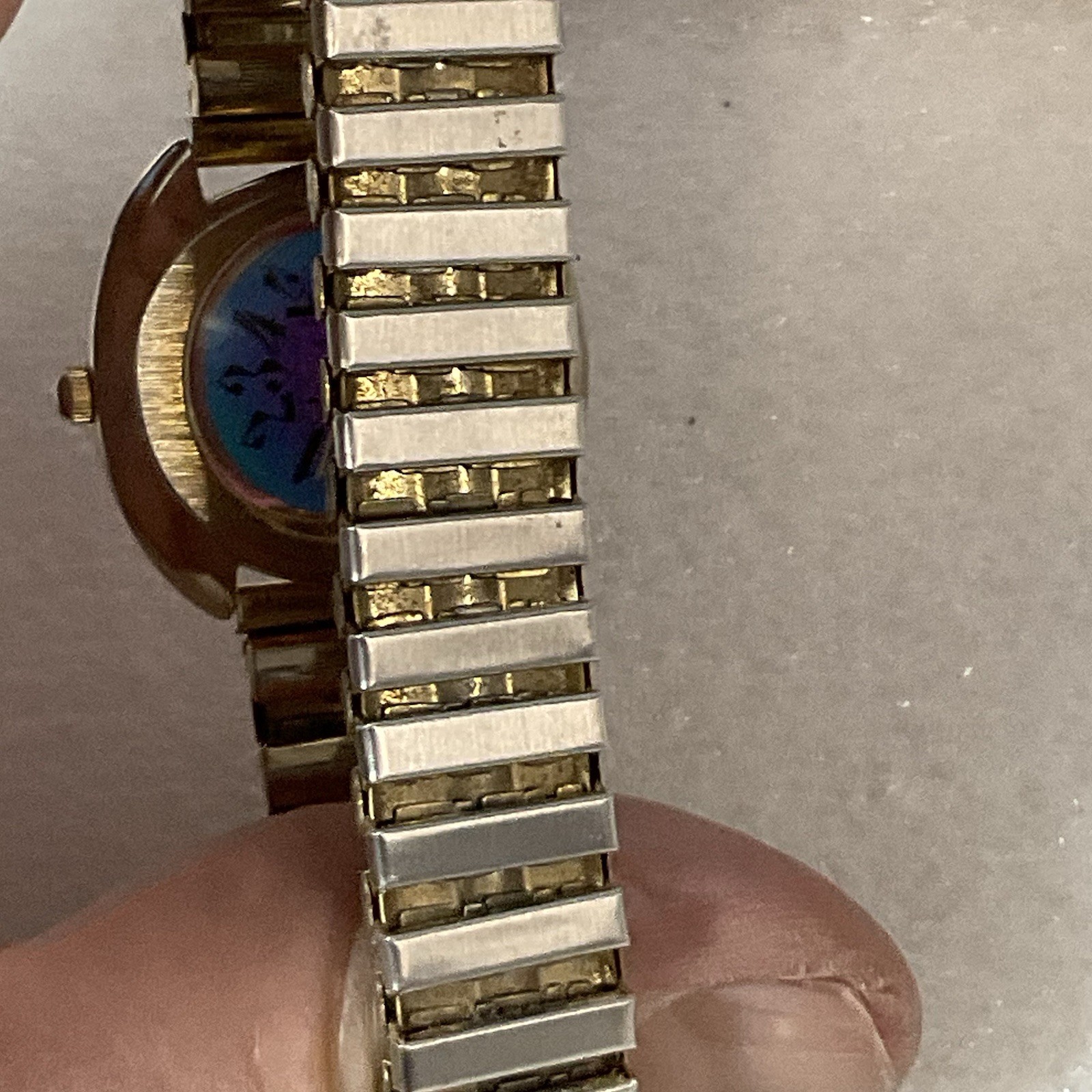 Lucky Star Titanium Purple Face Hold Tone Stretch Band Watch