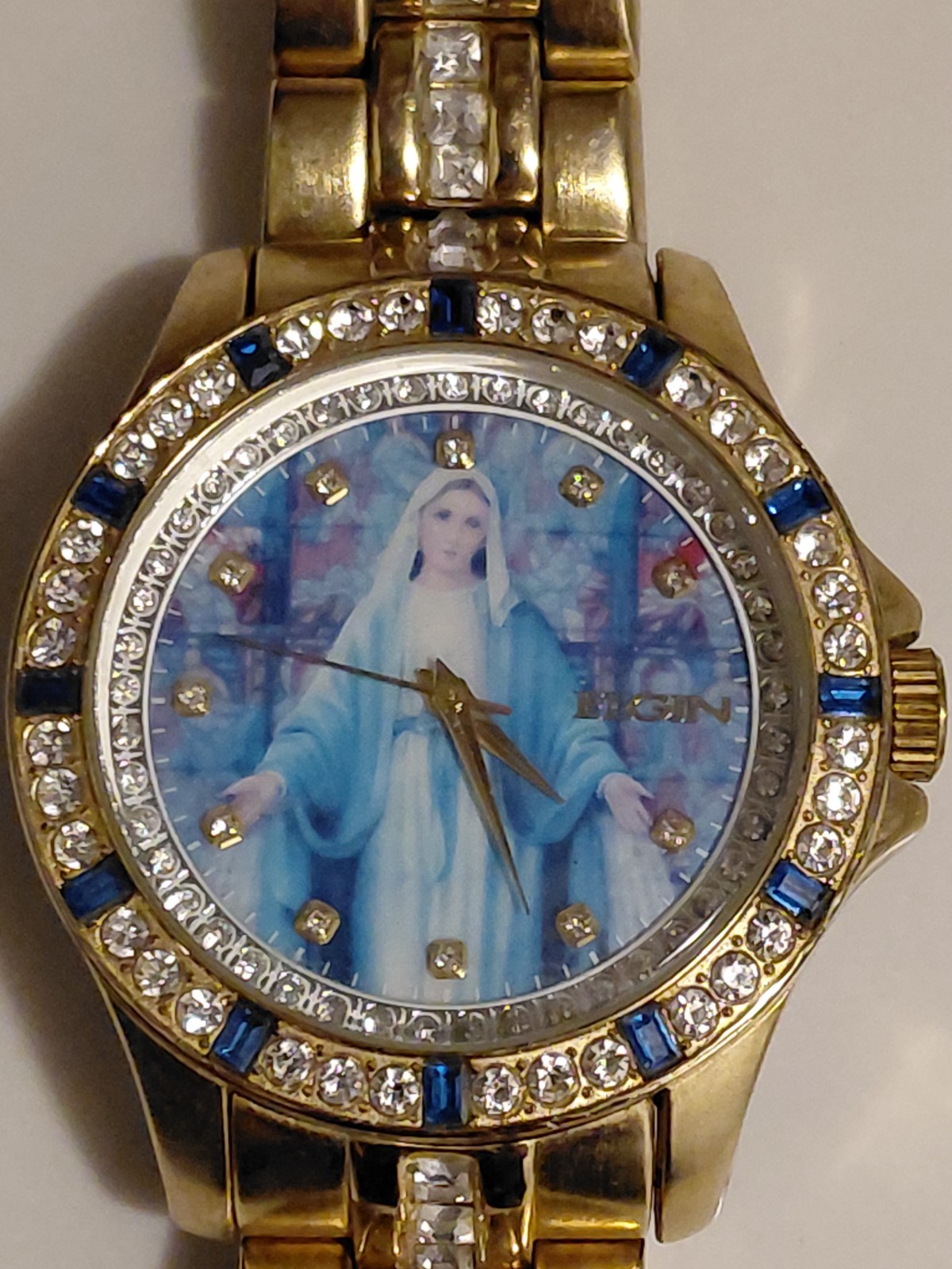 Elgin Women’s Analog Quartz Religious Dial Gold Tone Bracelet Gem-Set Bezel
