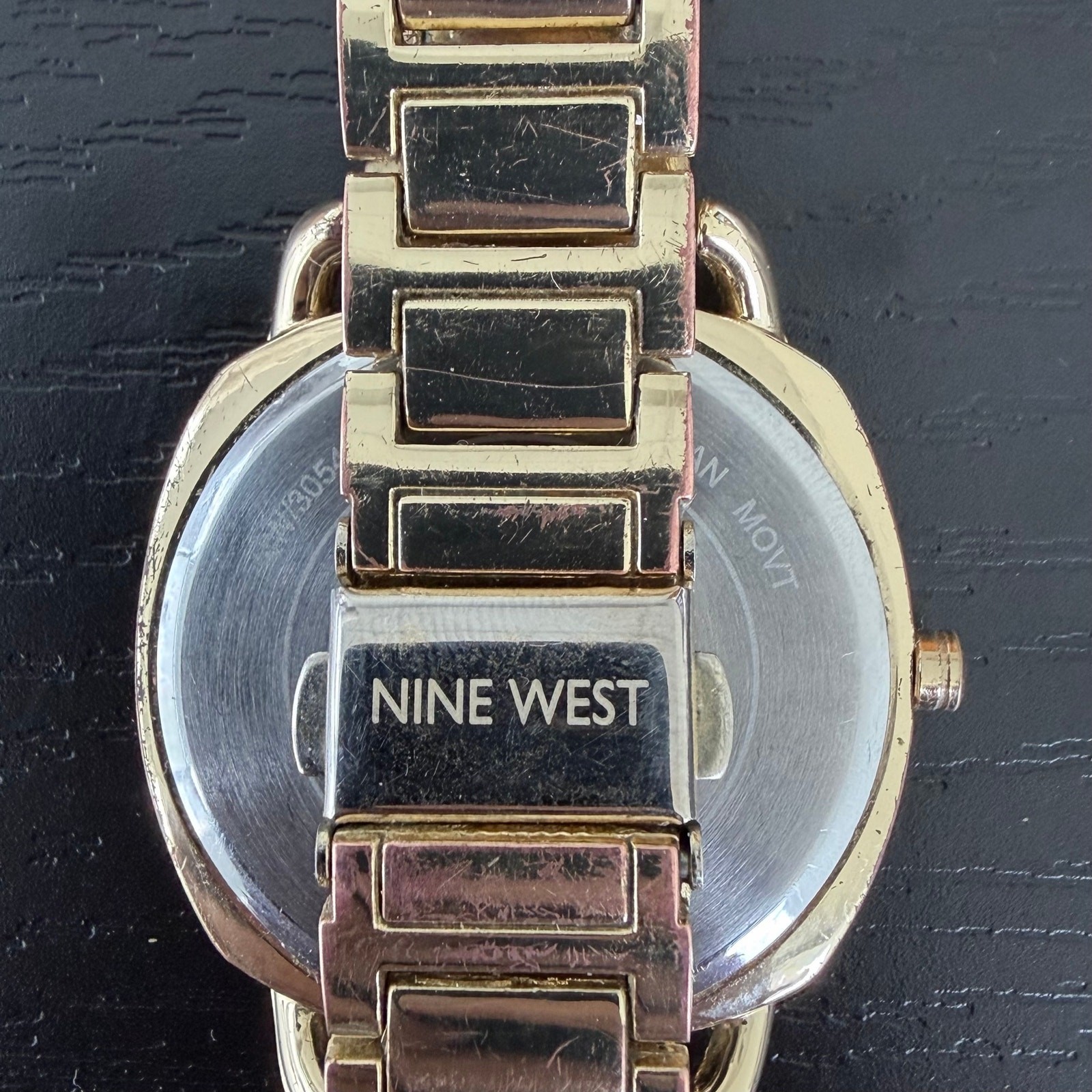 Nine West Women’s Black Dial Gold Tone Stainless Wrist Watch (PC21J7)