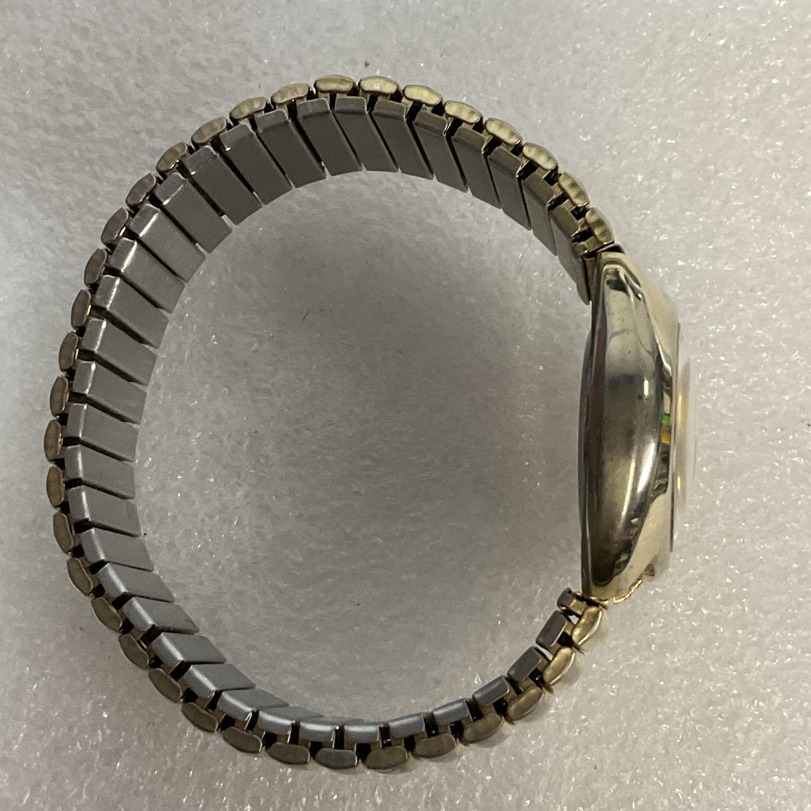 Lucky Star Titanium Purple Face Hold Tone Stretch Band Watch
