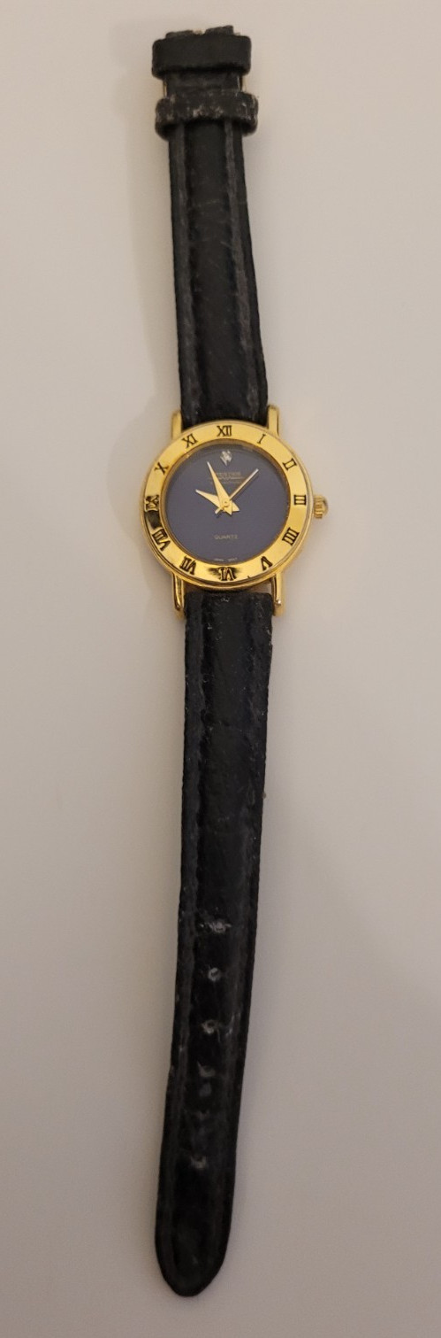 PRESTIGE by WALTHAM QUARTZ WATCH. DIAMOND DIAL WITH GOLD TONE