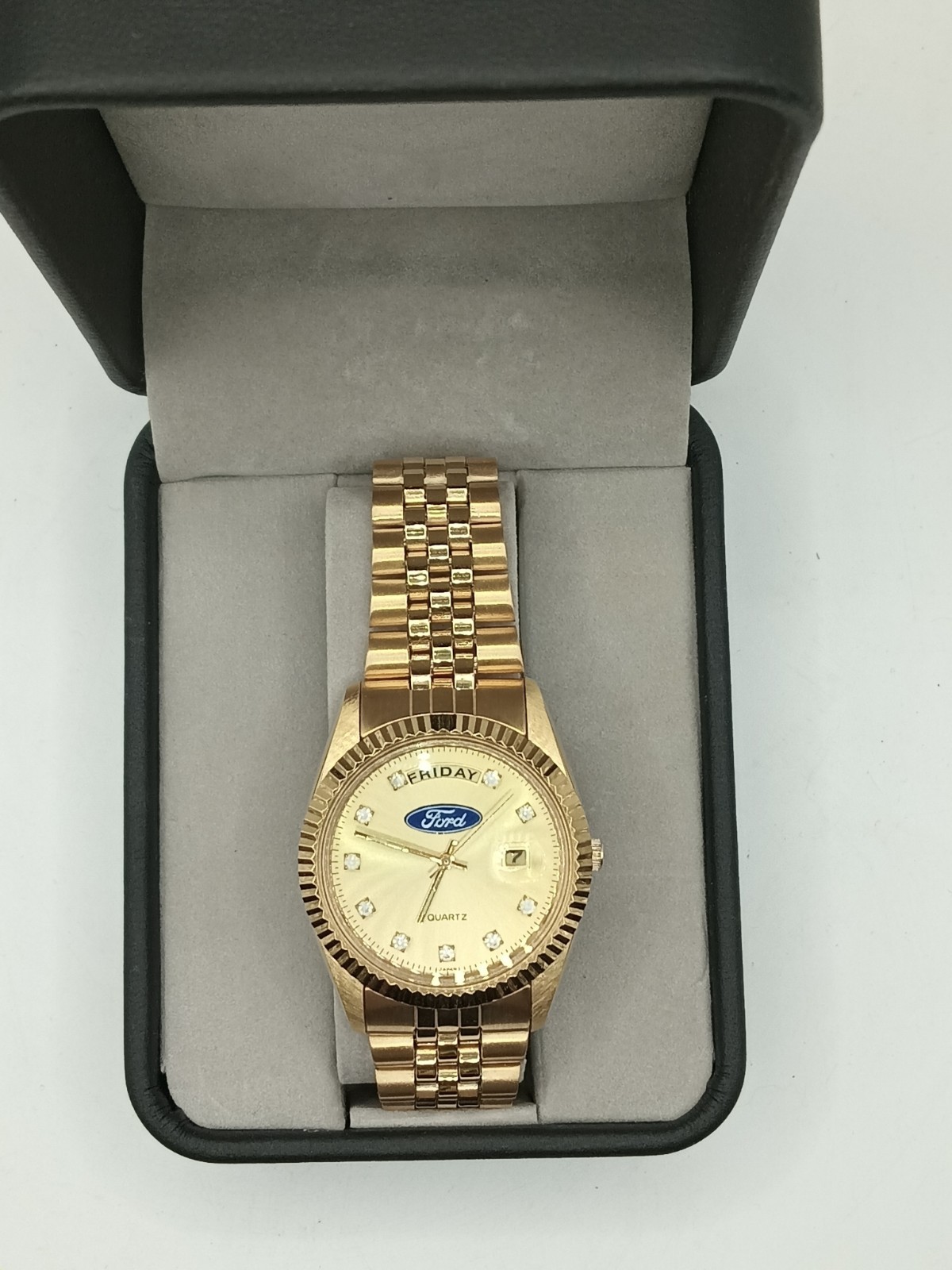 FORD GOLD TONE COLLECTORS WATCH WITH DAY AND DATE