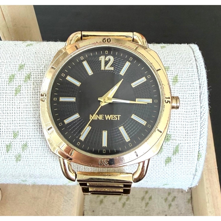 Nine West Women’s Black Dial Gold Tone Stainless Wrist Watch (PC21J7)