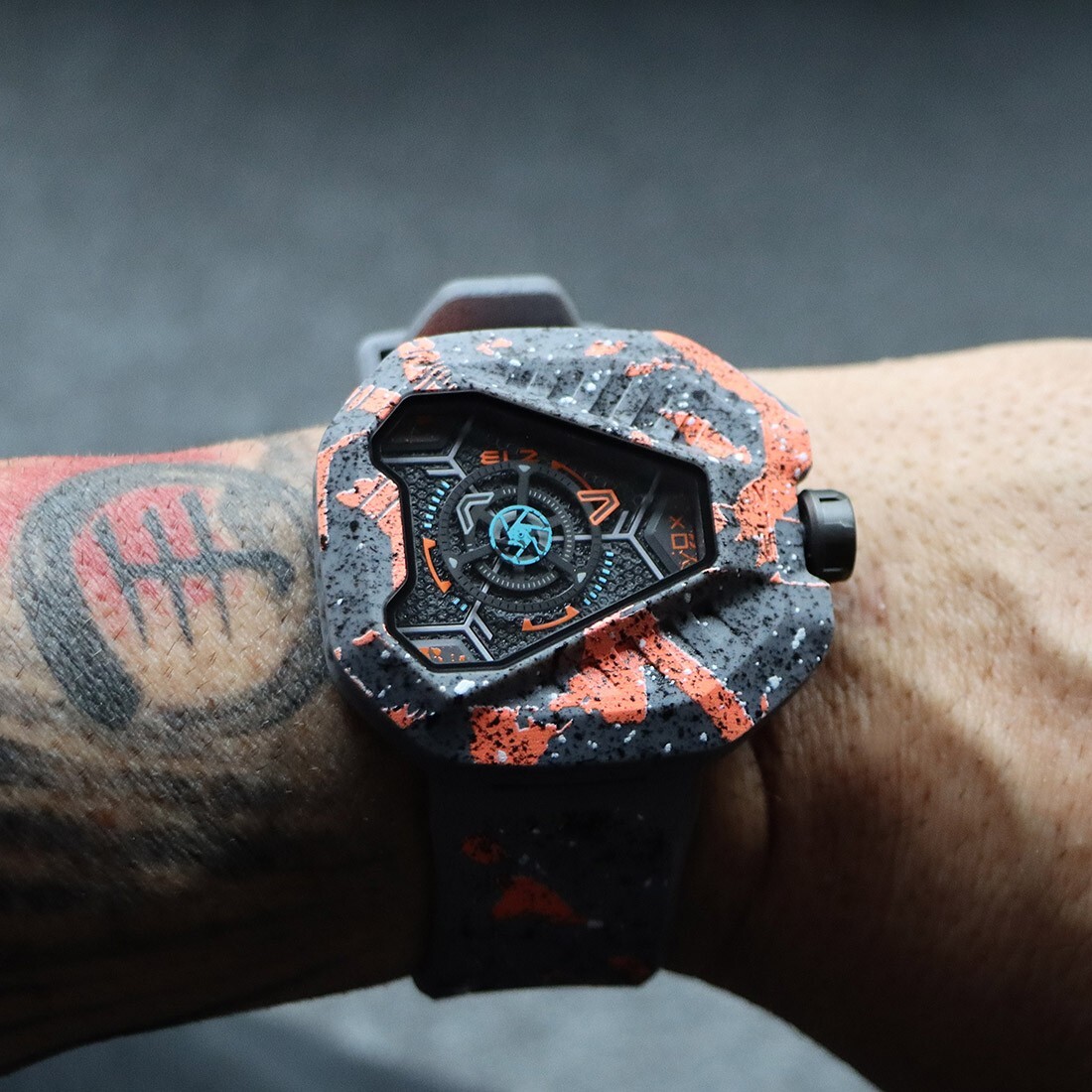 The ElectricianZ XO The Lunar Swiss Quartz Rubber Neon Orange PVD Men’s Watch