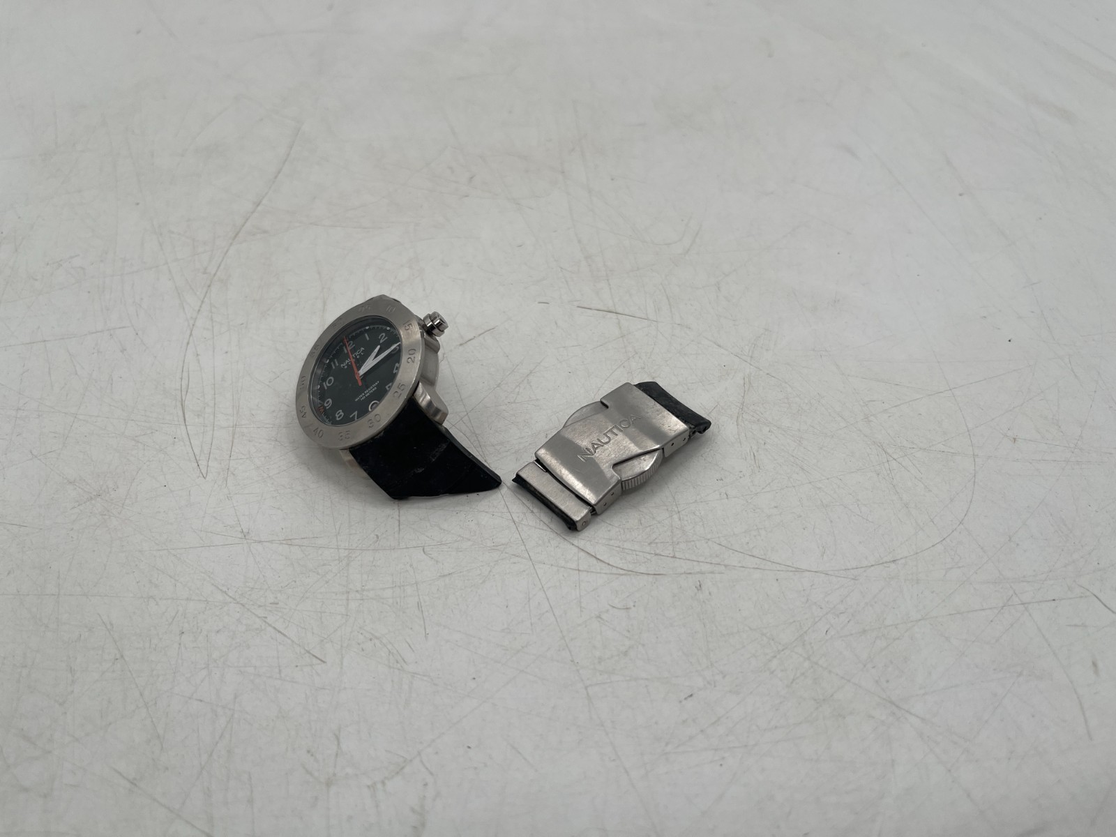Nautica Steel Wristwatch See Pictures broken band needs battery