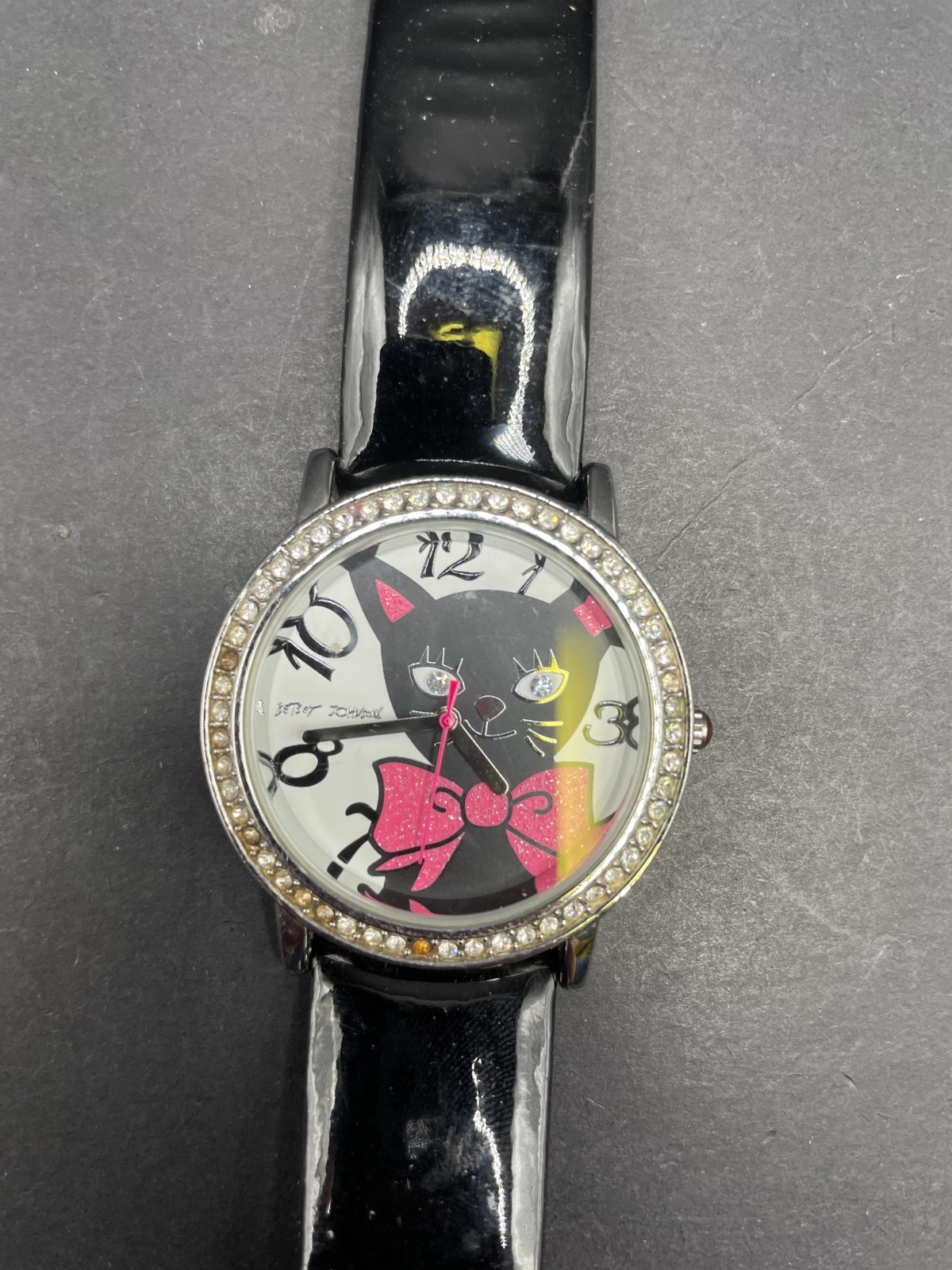Betsey Johnson Women’s Watch Cat Dial Pink Bow Rhinestones Black Band BJ00052-01