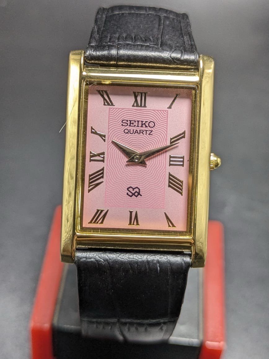 Seiko Quartz Rectangular Pink Dial Black Band Roman Numerals Men’s Watch